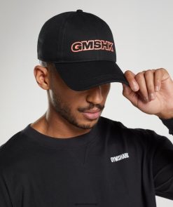 アクセサリー Gymshark GMSHK 野球帽 ブラック/ソルスティスオレンジ ユニセックス T2X2641126