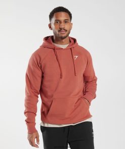 衣類 Gymshark クレストパーカー 柿赤 男性 T2X264804