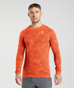 衣類 Gymshark ジオシームレス長袖Tシャツ ペッパーレッド/サルサレッド 男性 T2X264615